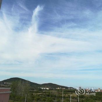 青岛出门就是海整天浪普通公寓酒店提供图片