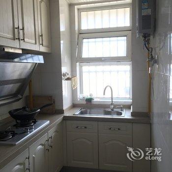 青岛火车站海景房罗曼小屋酒店提供图片