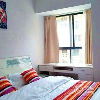 峨眉山市爱e家酒店式家庭公寓(食为天美食街店)酒店提供图片