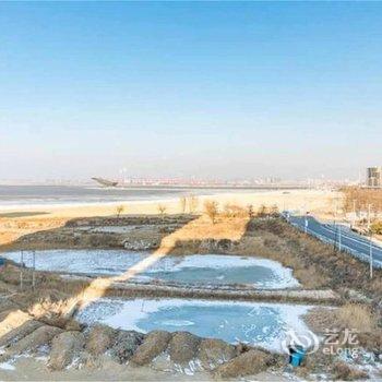 营口微微阳光海景公寓酒店提供图片