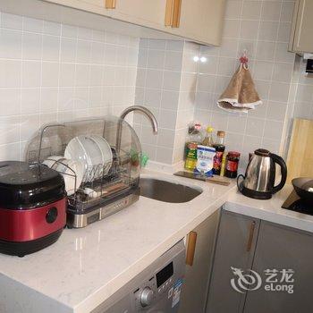 开封向上的小丑妞公寓酒店提供图片