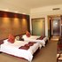 天津金世界酒店豪华双床房照片_图片