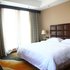 本溪巴里岛国际酒店商旅河景大床房照片_图片