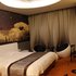 大连名传世纪酷贝拉主题酒店豪华大床房照片_图片