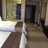 葫芦岛金港商务酒店豪华双床房照片_图片