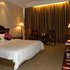 无为德龙国际大酒店标准大床房照片_图片