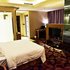 新疆福克吉瑞大酒店几木大床房照片_图片
