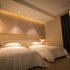 张家港国贸酒店商务楼标准双床房照片_图片