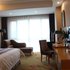 维也纳国际酒店(舒城克拉广场店)尊享豪华大床房照片_图片