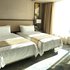 哈尔滨松北香格里拉大酒店豪华双床房照片_图片