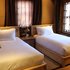 拉萨松赞吉曲林卡酒店布宫景高级套双床房照片_图片