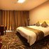 陕西阳阳国际酒店豪华大床房（一室一厅+观景躺椅）照片_图片