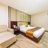 石狮华飞大酒店标准大床房照片_图片