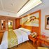 维也纳酒店(龙海角美万益广场店)标准大床房照片_图片
