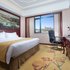 维纳斯国际酒店(上海国际旅游度假区航头地铁站店)豪华大床房照片_图片