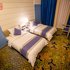 速8酒店(库尔勒万和大厦店)高级双床房照片_图片