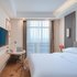维也纳国际酒店(平湖张江科技园店)标准大床房照片_图片