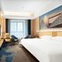 维也纳国际酒店(重庆大足中心店)高级大床房照片_图片