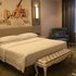 维也纳国际酒店(南京新港开发区店)高级大床房照片_图片