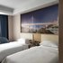 维也纳国际酒店(重庆大足中心店)豪华双床房照片_图片