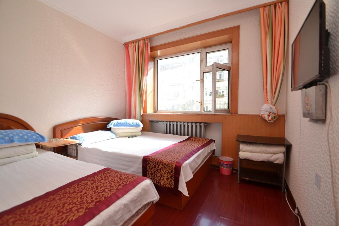 Harbin Yikang Family Hotel