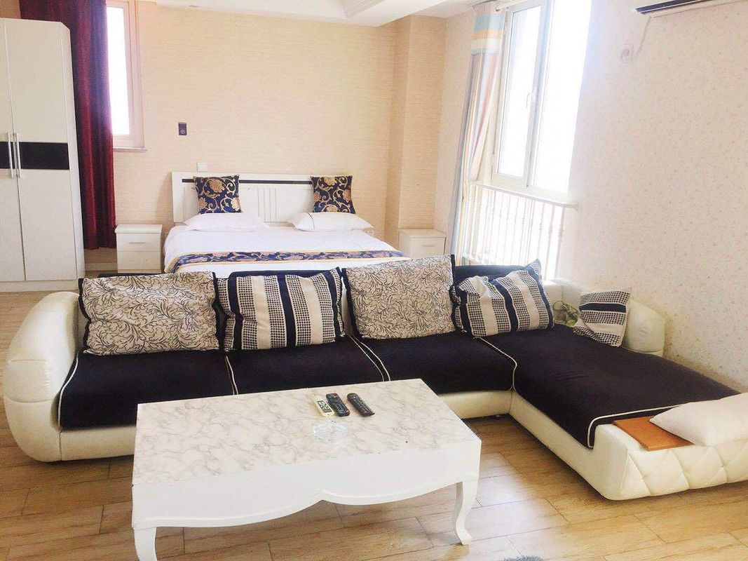 Qingdao Lubang Aijia Apartment (Lubang Customs Street Shop)