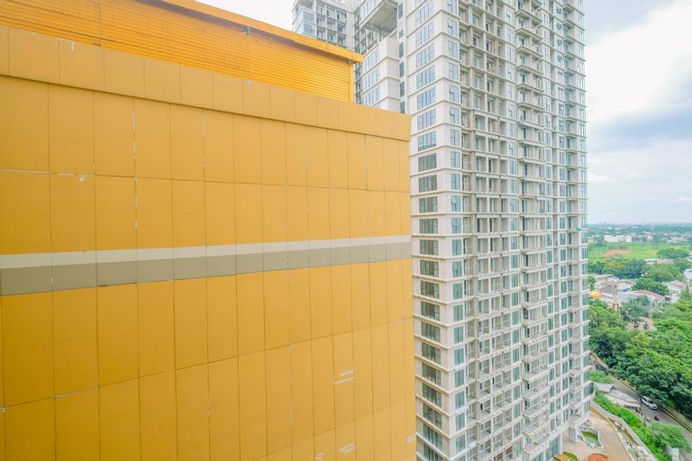 Cozy and Clean 2BR at Transpark Cibubur Apartment By Travelio