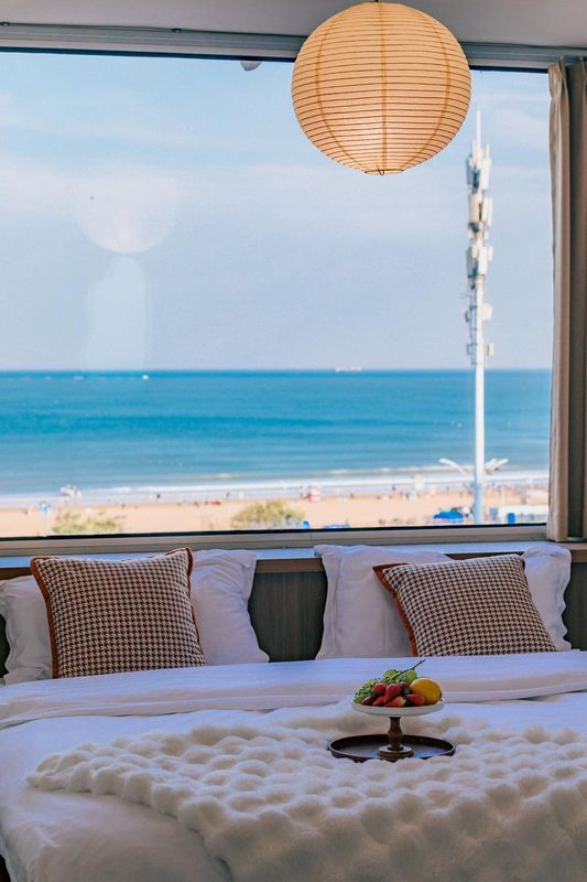 沐海海景影音民宿(青島金沙灘店)