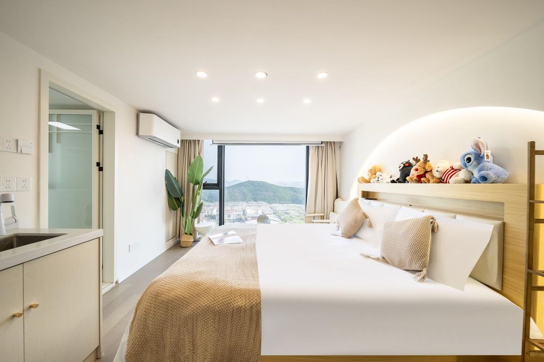 Miluu Movie Apartment (Nanjing Xianlin University City Wanda Mall)