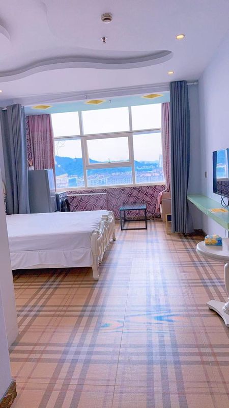 Wuzhou Theme Apartment