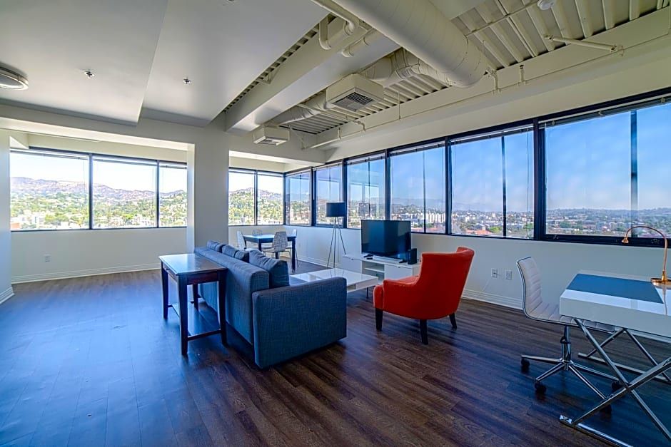 吉諾西都會公寓酒店