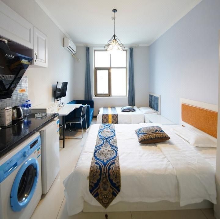 Xingxing Holiday Hotel Apartment