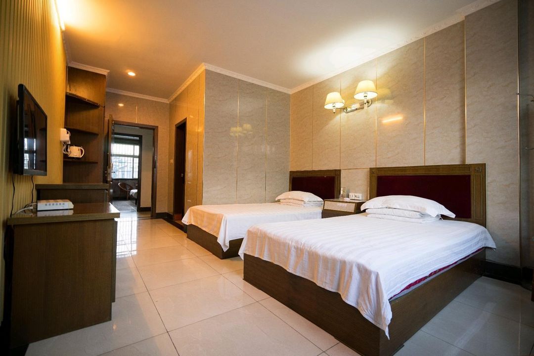 Hua Hui Hotel (Dang Tu 86 Hospital Gushi Road Shop)