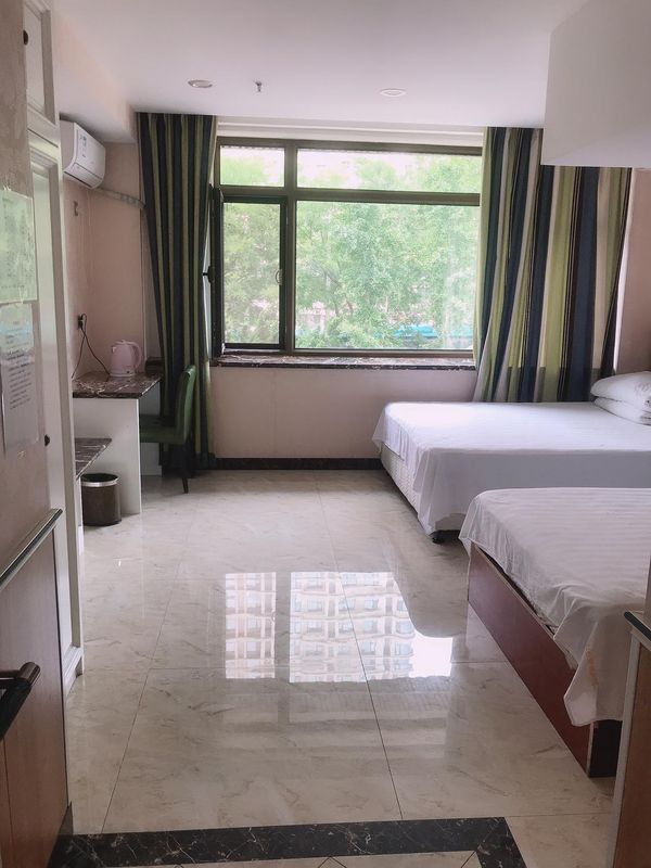 Dalian Junyue Wangcheng Business Hotel