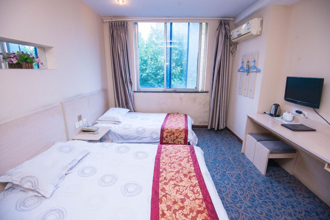 Guishilai Hotel (Jiangsu Ning Square Jiangsu University Affiliated Hospital Branch)