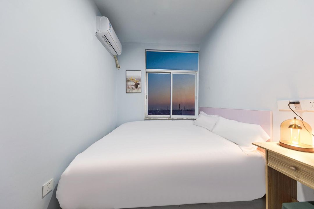 Shigua Hotel Apartment (dongxinyuan Subway Store)