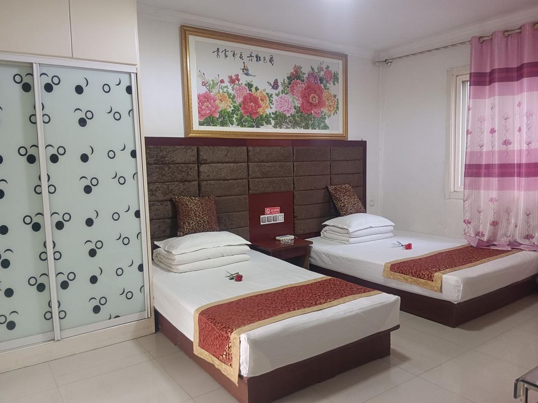 Harmonious Apartment Hotel (Xi'an Changle Xiyuan Branch)