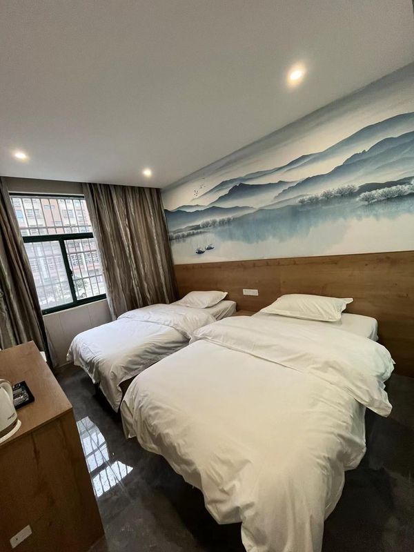 Wuxi 6+1 Business Hotel
