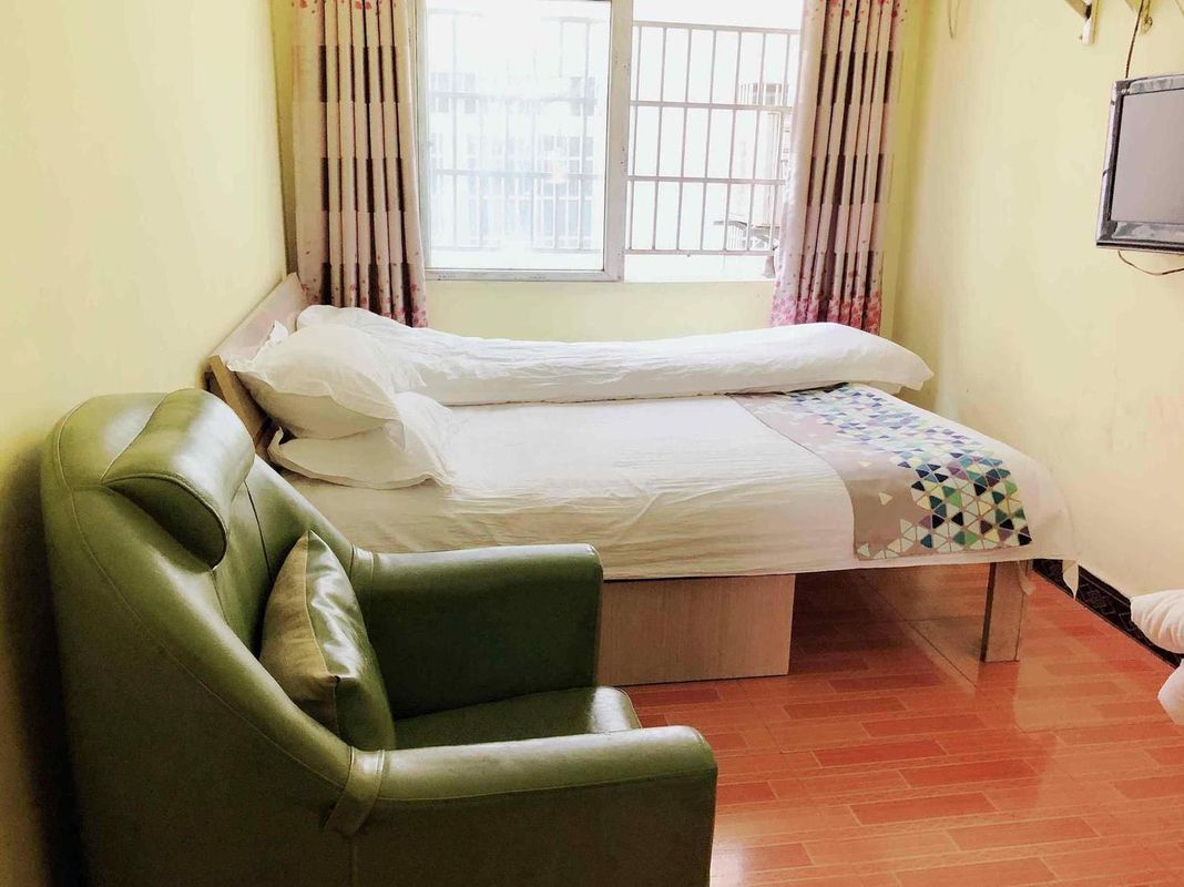 Qingcheng Hotel (Wuhan Yangluo Passenger Transport Terminal Yangluo No.4 Elementary School Branch)