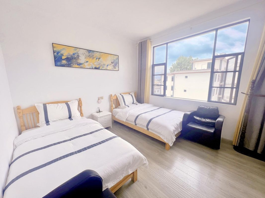 漫悅居民宿(麗江高鐵站店)