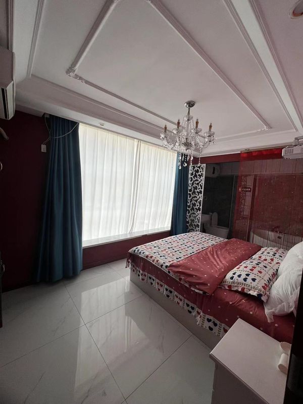 Tieling July Theme Hotel