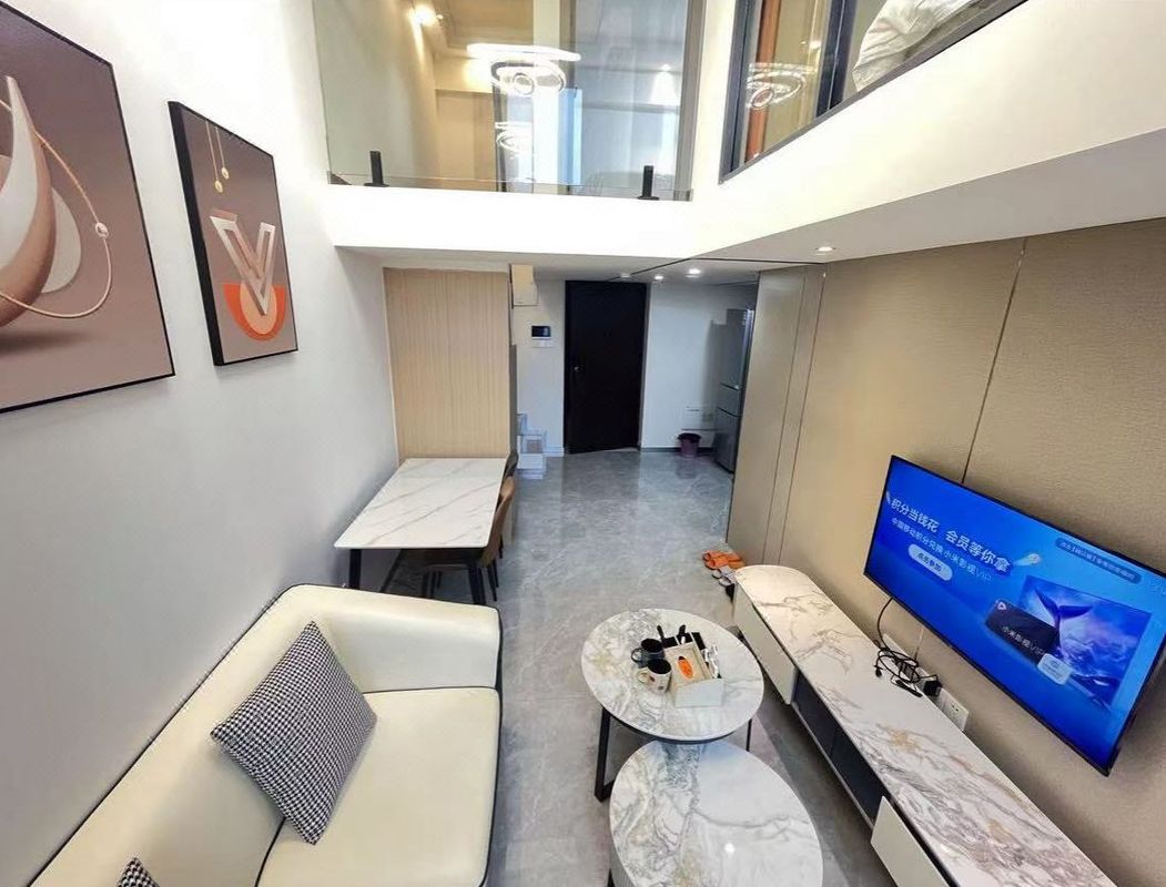 深圳新誠德公寓(龍光玖龍臺藍鯨世界店)