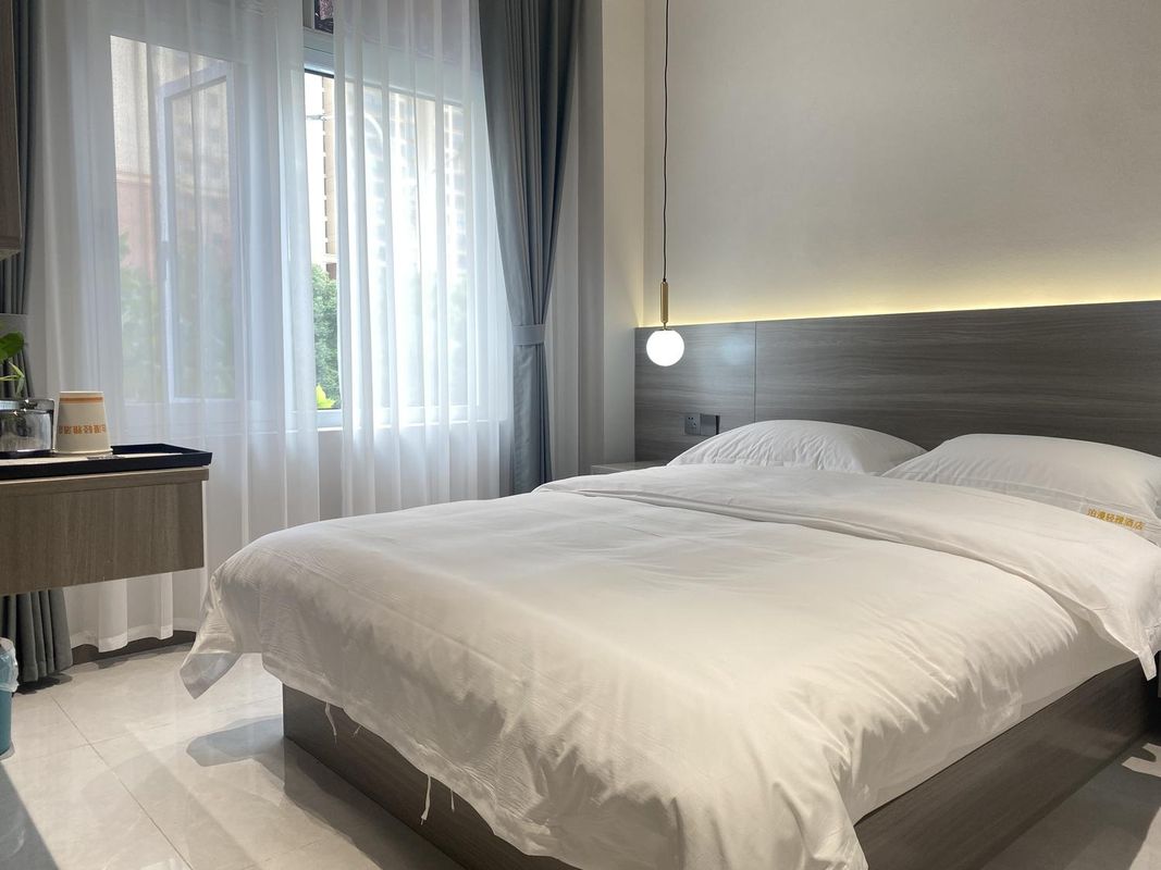 Wuhan Boman Qingya Hotel (Wuchang Institute of Technology Longhu Baisha Tianjie)