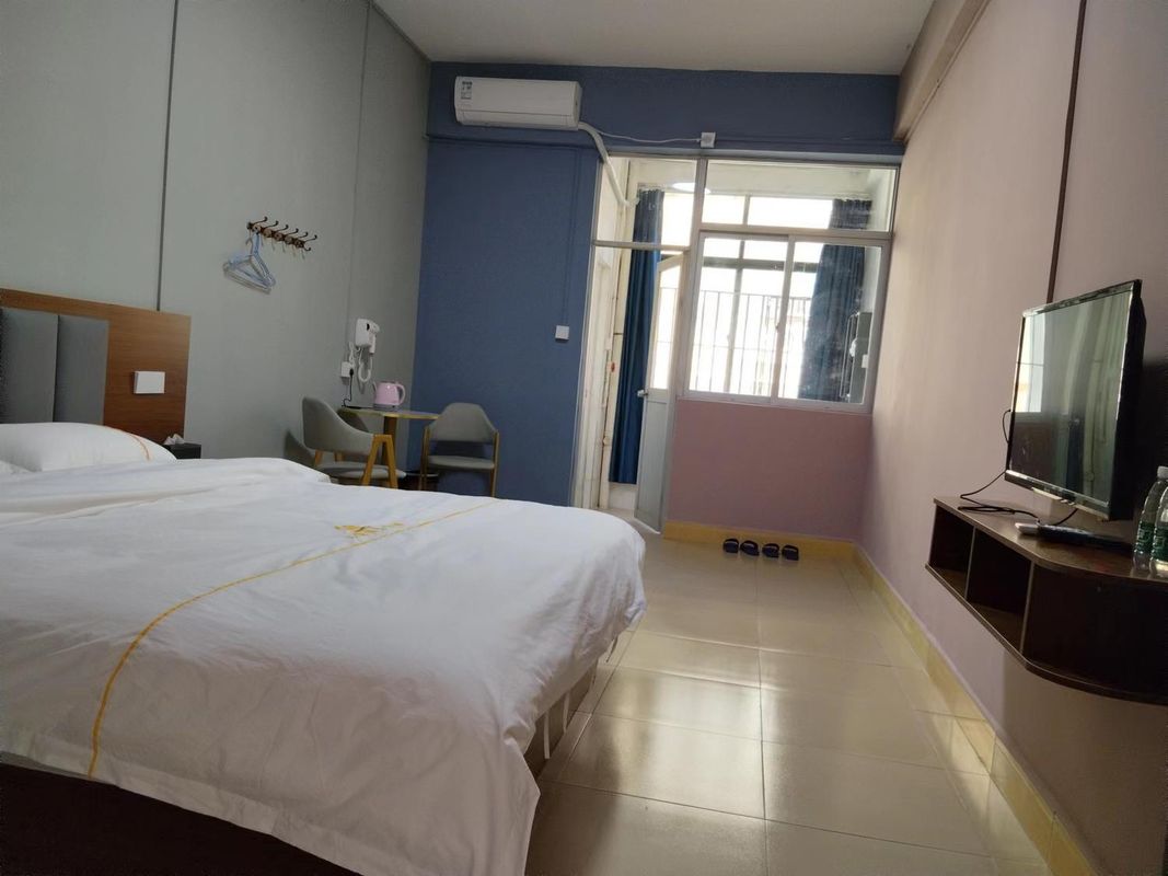 Wanli Business Apartment (Zhenlong Town)