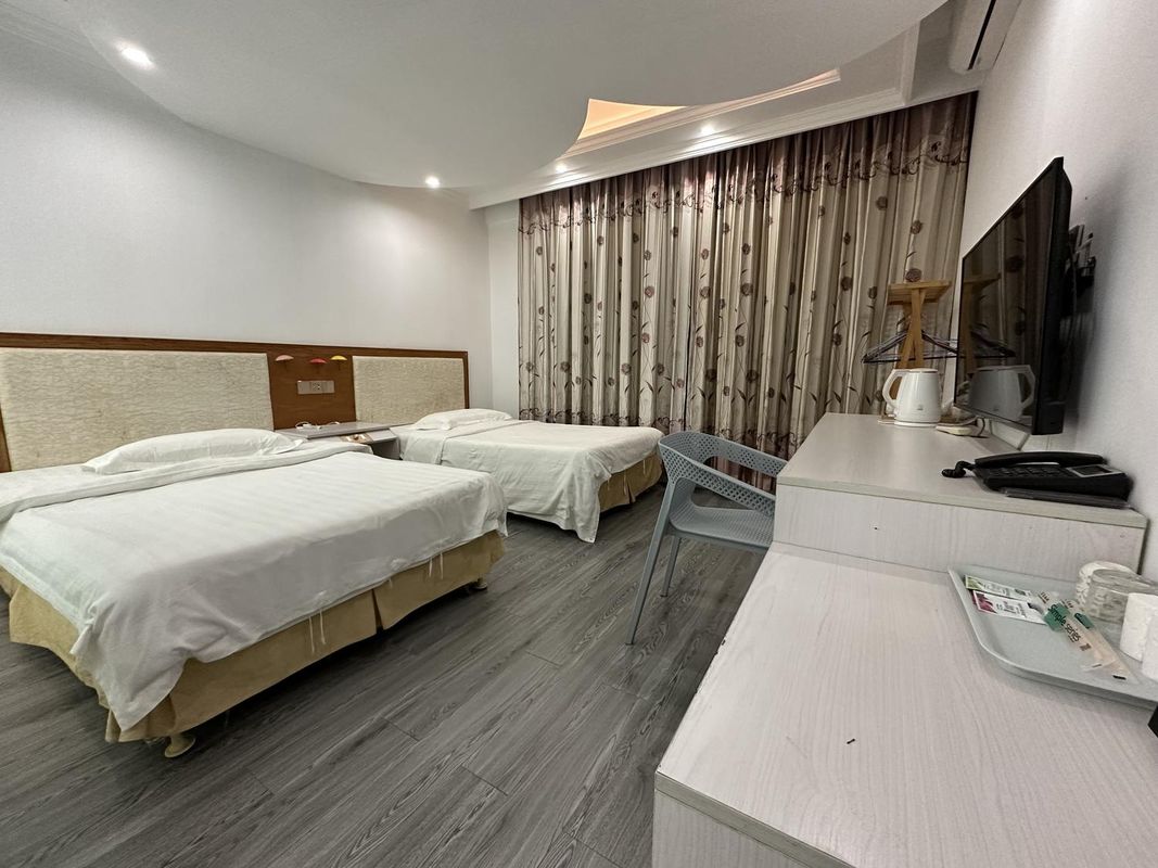 Sanya Tiandu Duqinglou Business Hotel