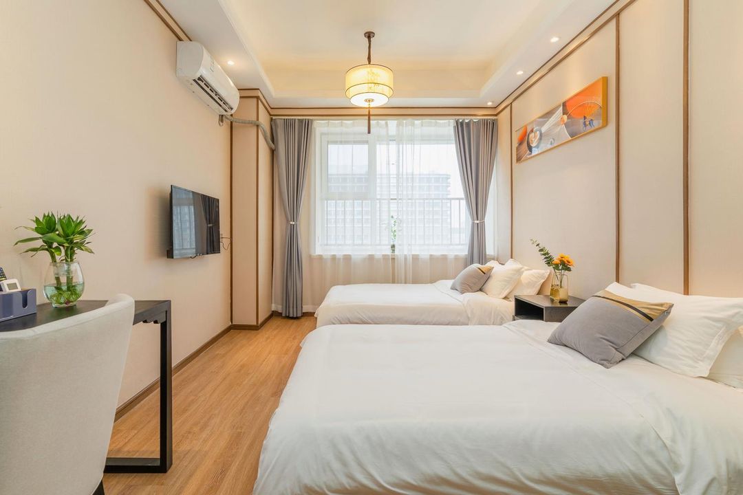 Qingdao Honghai Yaju Apartment (China Railway World Expo City)