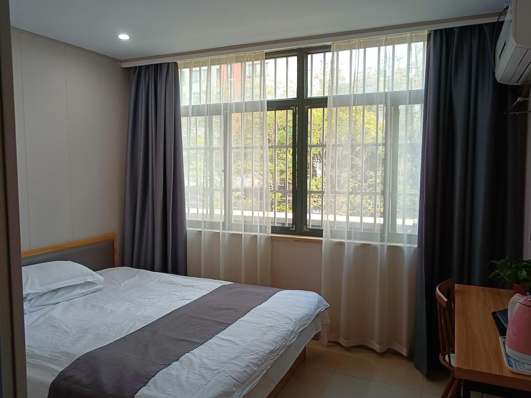 Wuxi Xiuxi Yizhan Business Inn