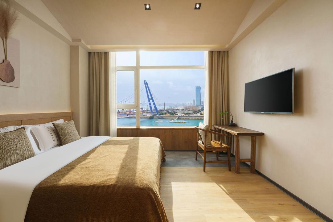 納穆一克拉城市民宿酒店(大連星海廣場店)