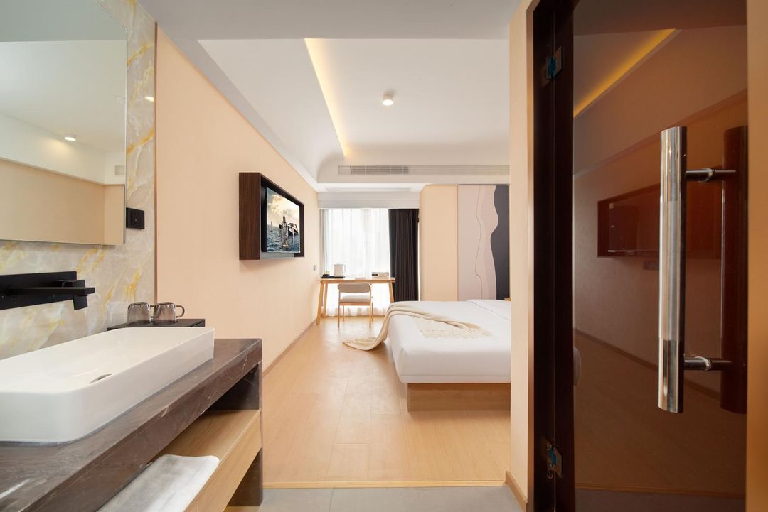 Feifan Impression Hotel (Wuhan Longhu Baisha Sky Street)