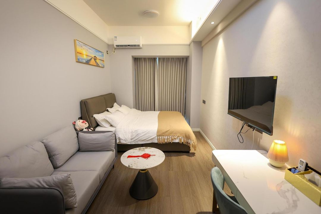 Huantu Time Apartment (Sanlongwan Avenue Poly Country Garden Tianhui)